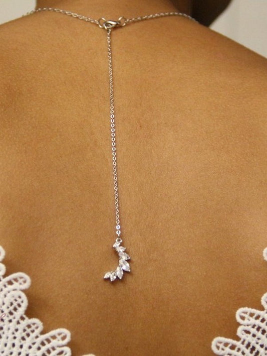 Pendentif de dos mariage croissant de lune sertis marquises