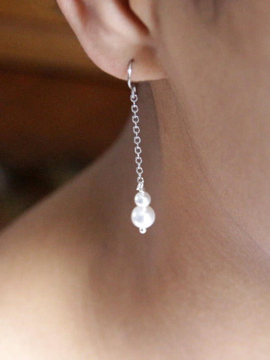 Boucles d'oreilles mariage duo de perles sur fine chaîne