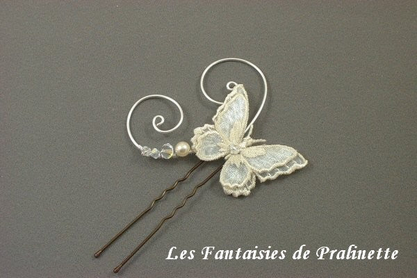 Pic papillon voile et arabesques