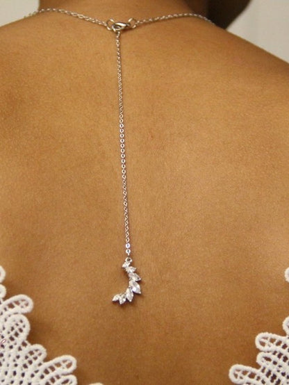 Pendentif de dos mariage croissant de lune sertis marquises