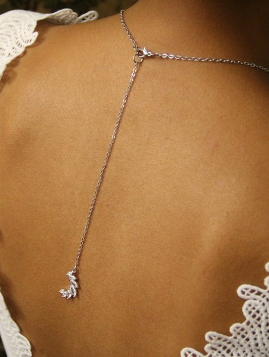 Pendentif de dos mariage croissant de lune sertis marquises