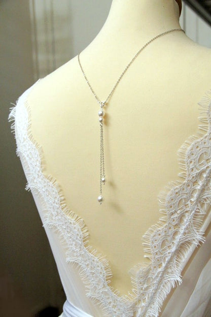 Collier de dos Irenée avec fermoir et pendentif de dos amovible
