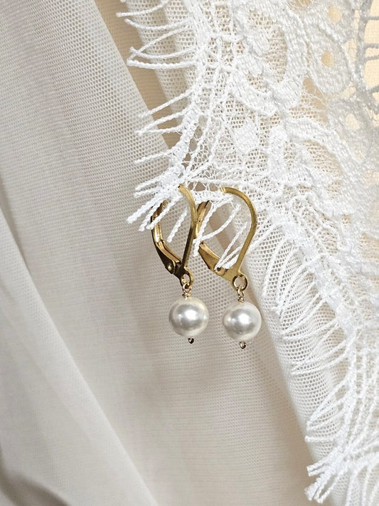 Boucles d'oreilles dormeuses solitaire Ethan