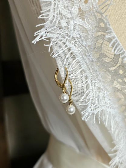 Boucles d'oreilles dormeuses solitaire Ethan
