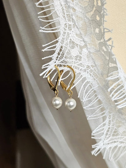 Boucles d'oreilles dormeuses solitaire Ethan