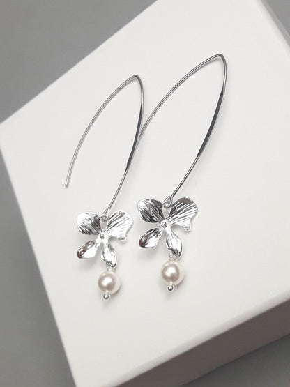 Longues boucles d'oreilles mariage fleurs orchidées