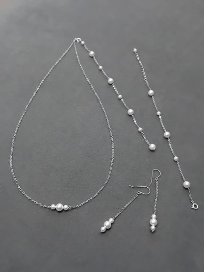 Parure bijoux mariage perlée Eve - Collier de dos, bracelet perles, boucles d'oreilles