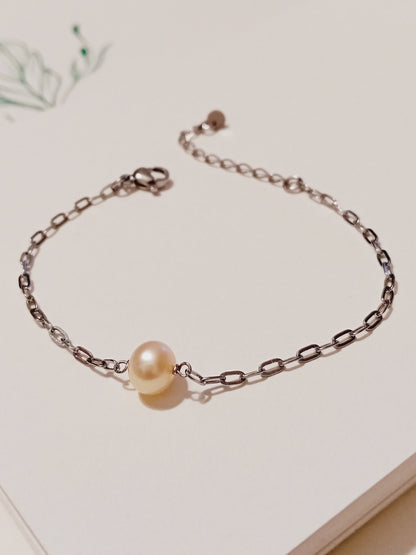 Bracelet Arya perle d'eau douce pêche et acier inoxydable argenté