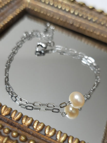 Bracelet Arya perle d'eau douce pêche et acier inoxydable argenté