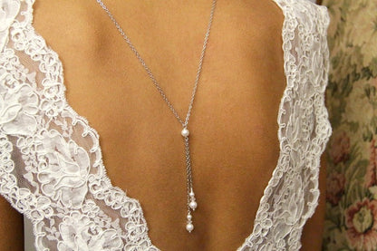 Collier de dos bijoux mariage Loan