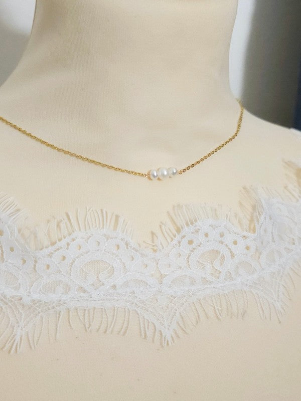Bijou mariage Jad collier de dos fleur de nacre et perles