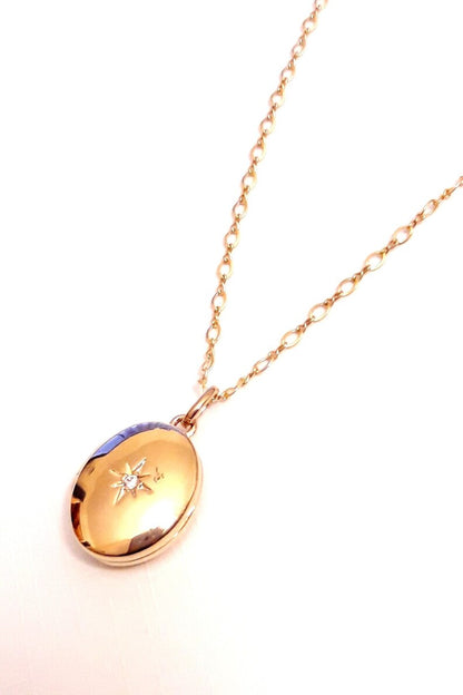Pendentif ovale cassolette porte-photo et zirconium