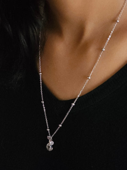 Collier perlé goutte en cristal de roche et pampilles
