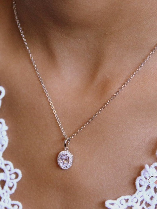Pendentif collier de mariage ovale en zirconiums finitions dorées