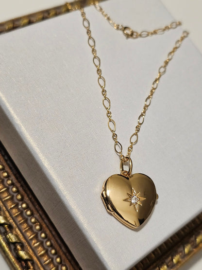Pendentif coeur cassolette porte-photo et zirconium