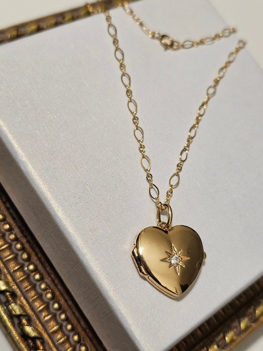 Pendentif coeur cassolette porte-photo et zirconium