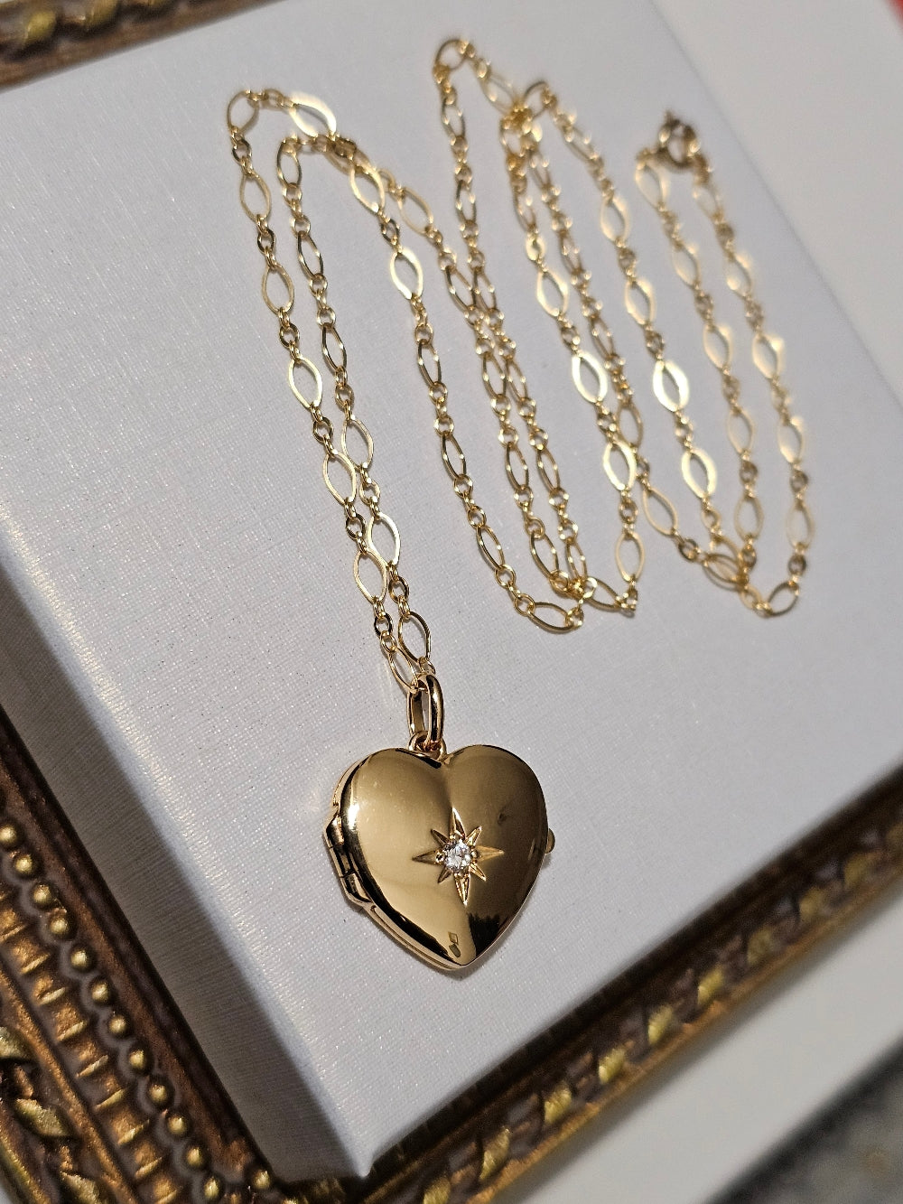 Pendentif coeur cassolette porte-photo et zirconium