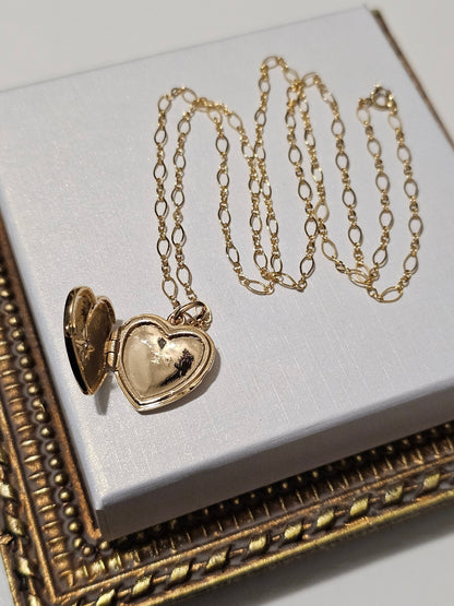 Pendentif coeur cassolette porte-photo et zirconium