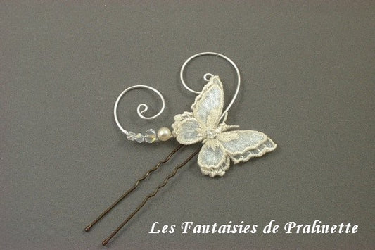 Pic papillon voile et arabesques